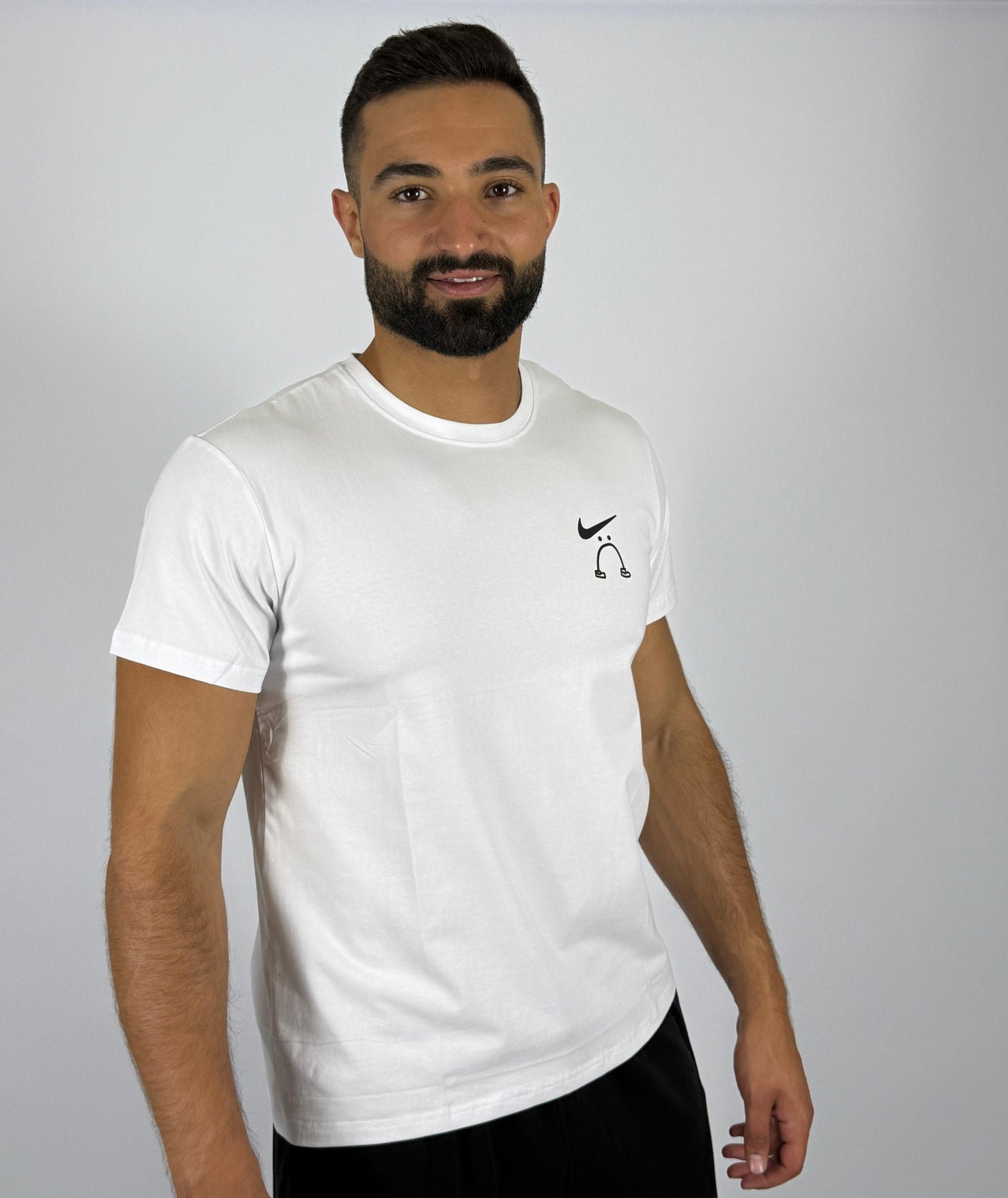 Men's Nike "Swoosh Smile" Graphic T-Shirt - Crisp White Playful Logo Tee