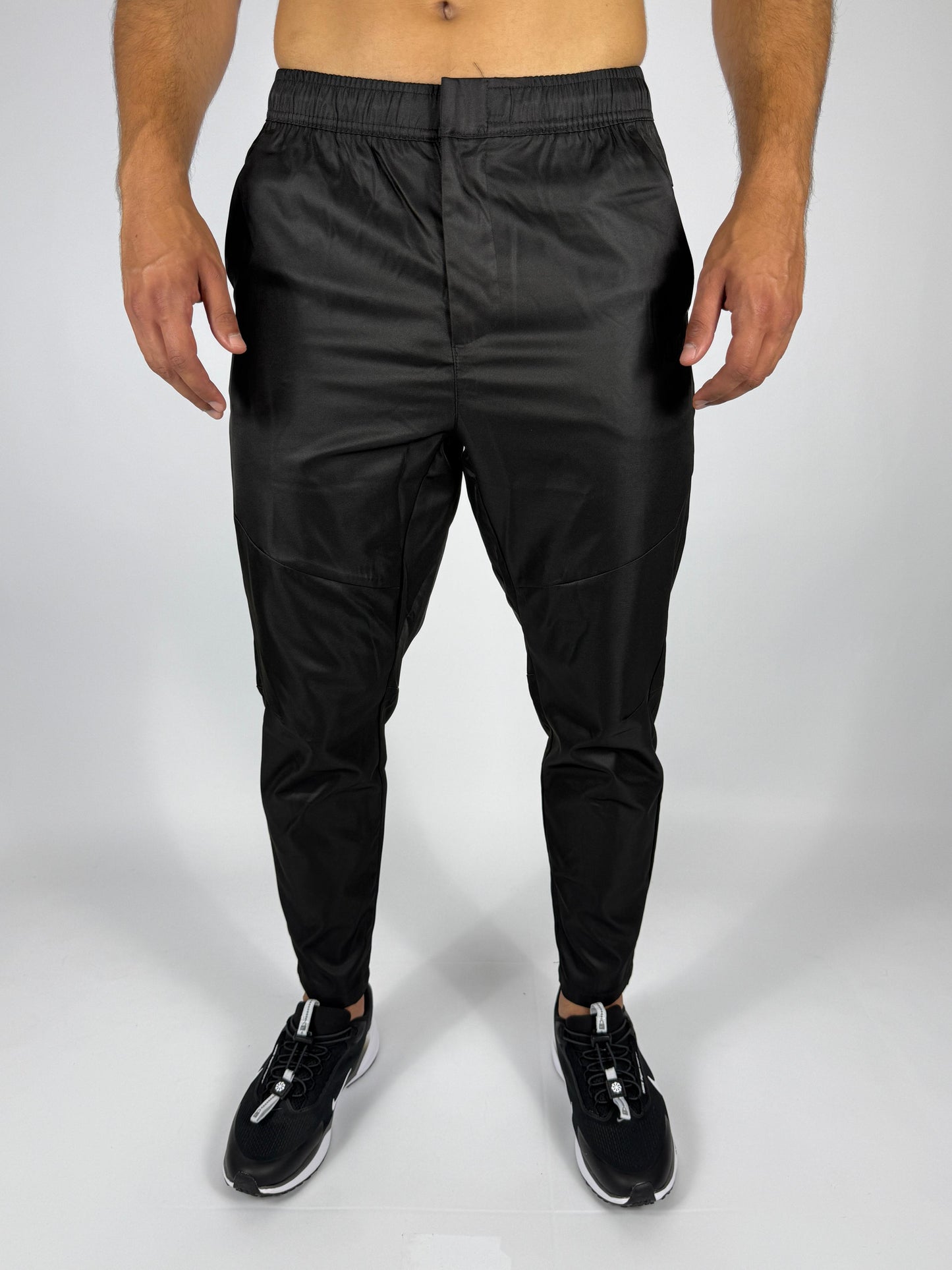 Men's Black Nike Track Pants with Zippered Pocket