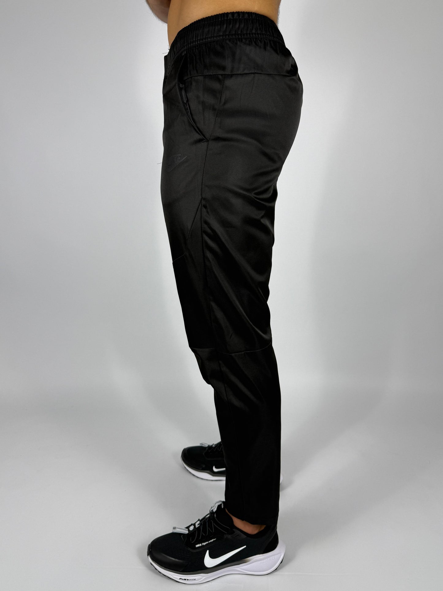 Men's Black Nike Track Pants with Zippered Pocket