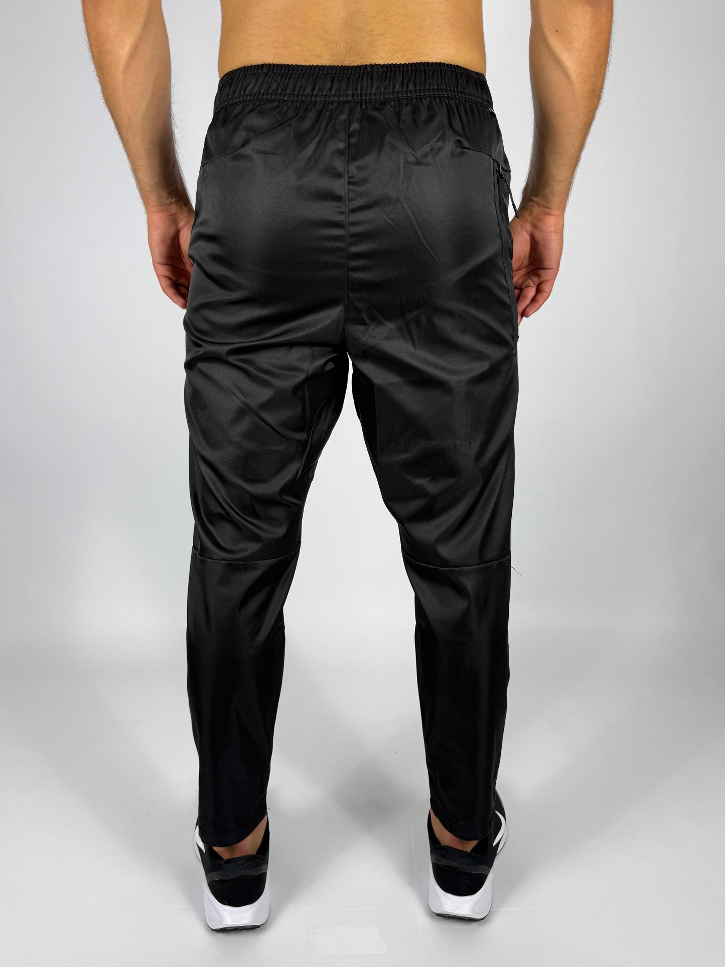 Men's Black Nike Track Pants with Zippered Pocket