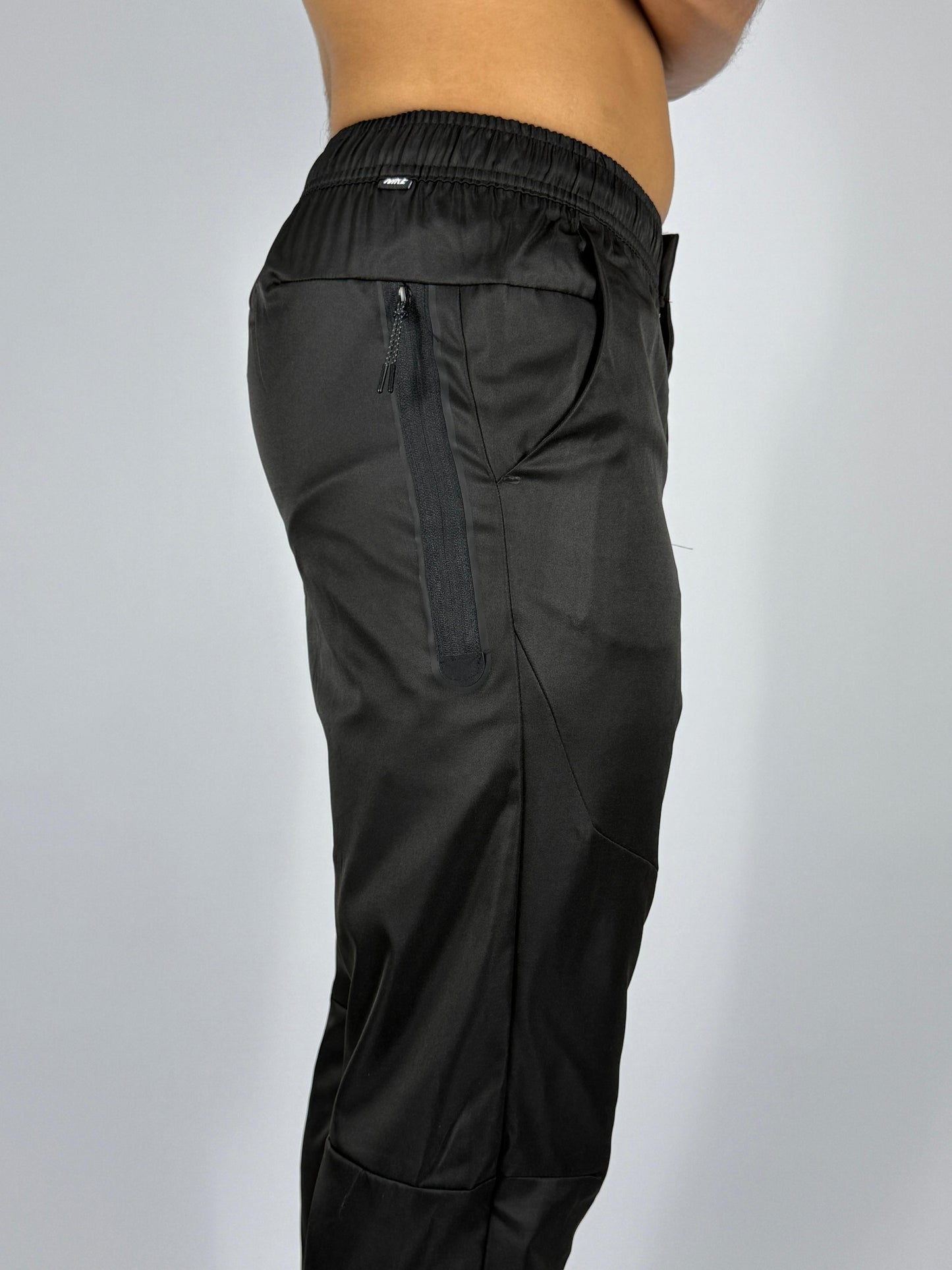 Men's Black Nike Track Pants with Zippered Pocket