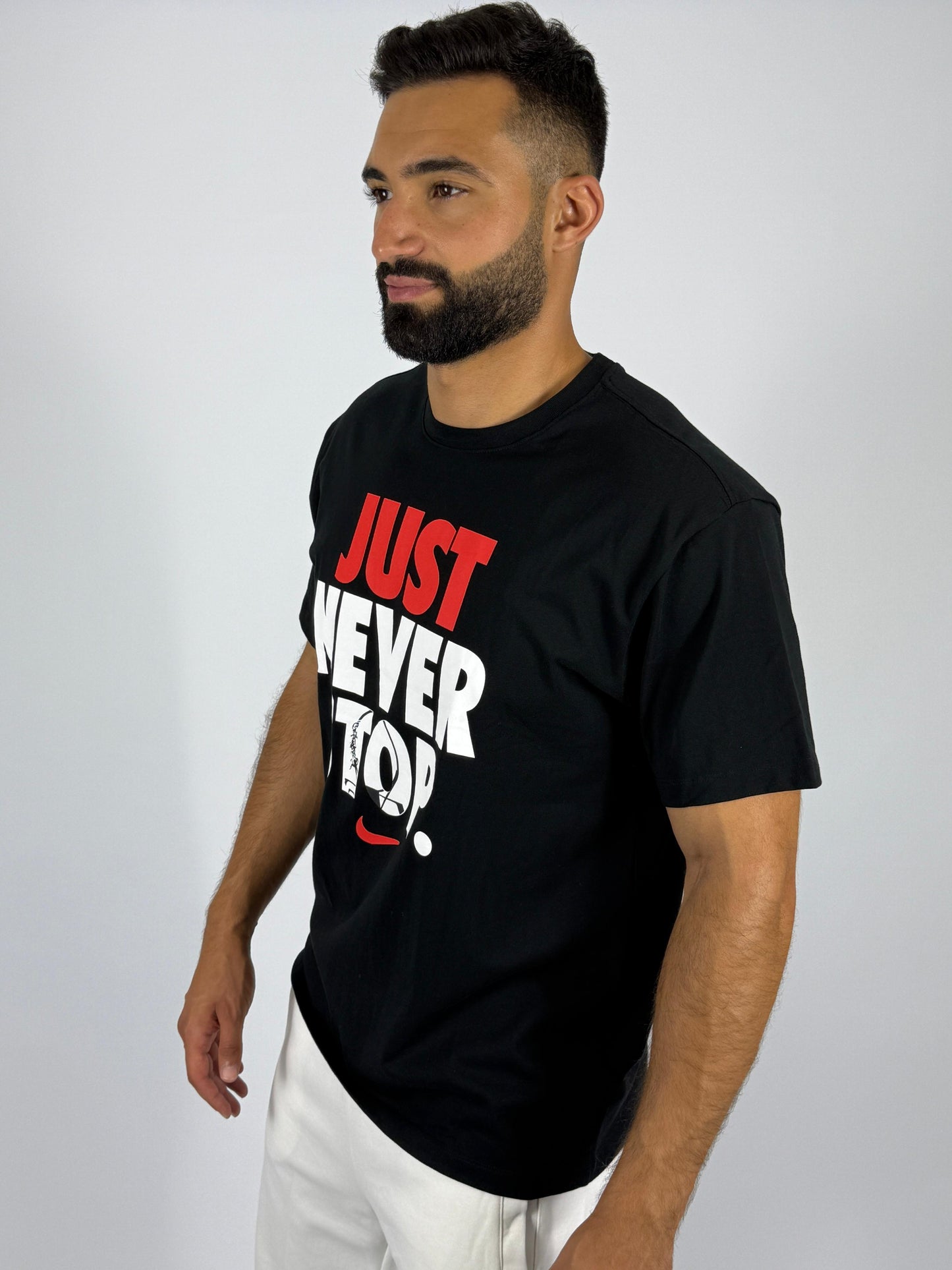 Men's Nike "Just Never Stop." Graphic T-Shirt - Black Performance Tee