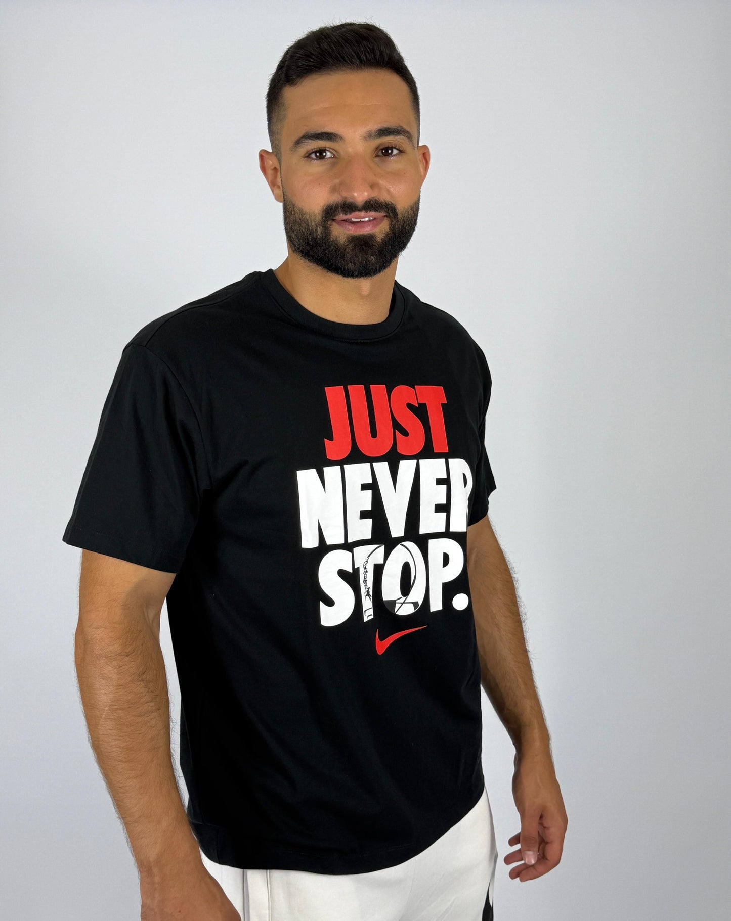 Men's Nike "Just Never Stop." Graphic T-Shirt - Black Performance Tee